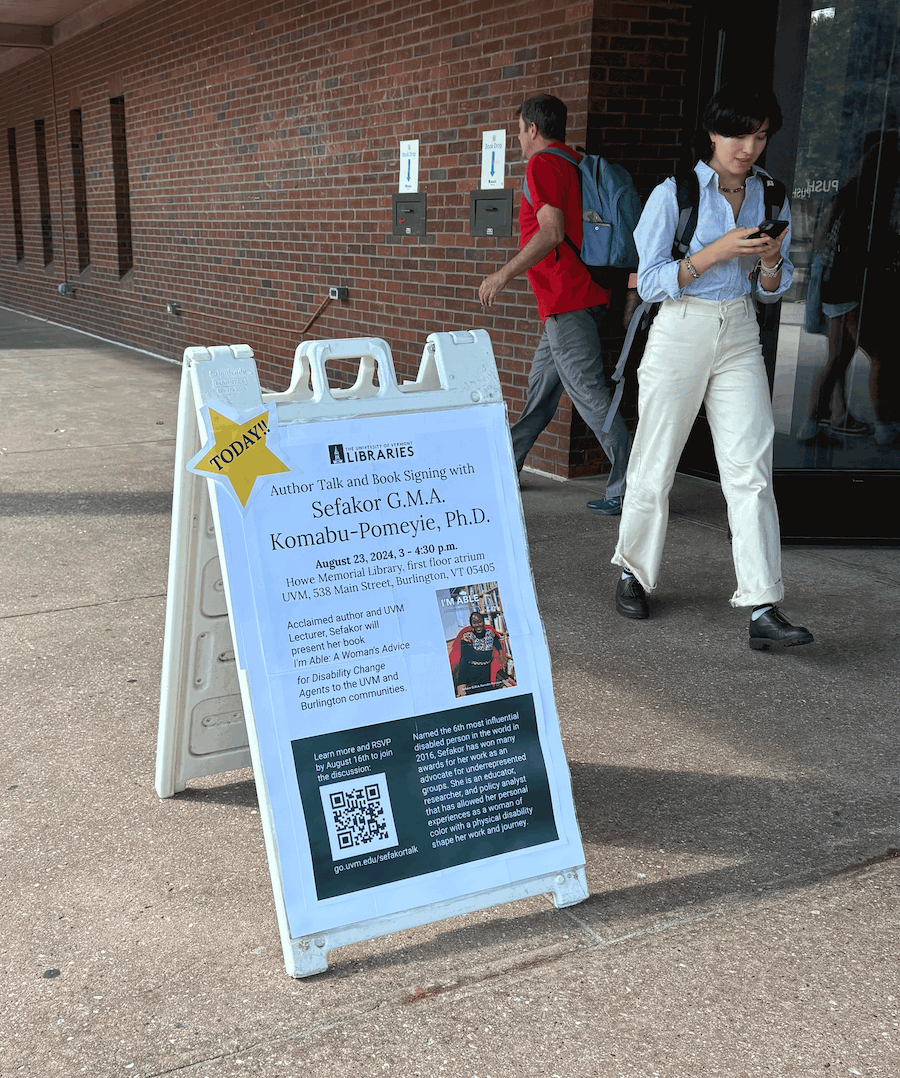 sandwich board sign in front of Howe library indicates author talk for Sefakor Komabu-Pomeyie